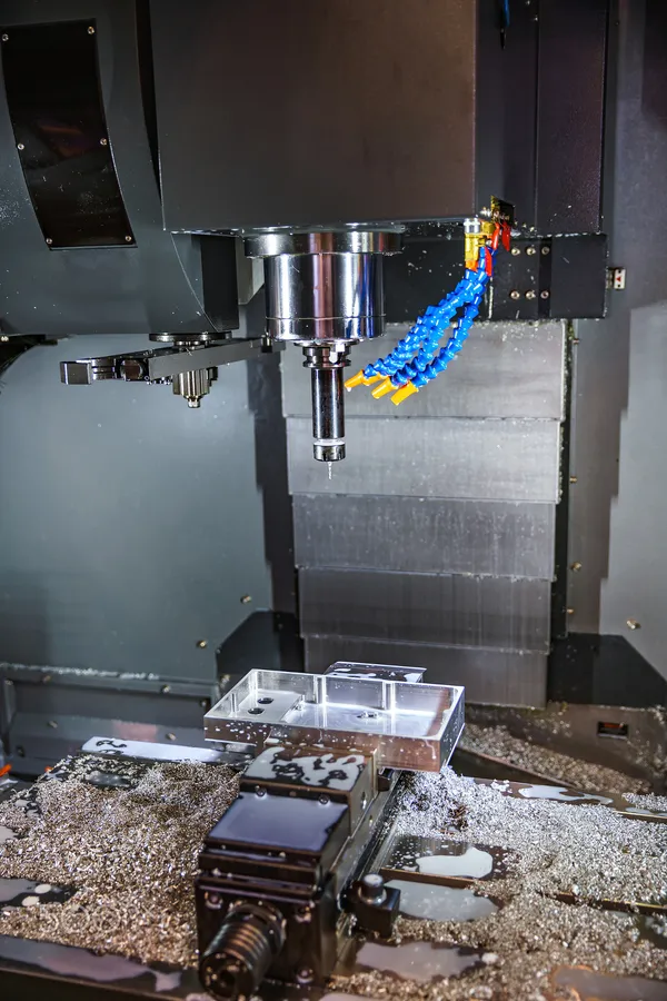 a CNC machine showing inner working area of the machine